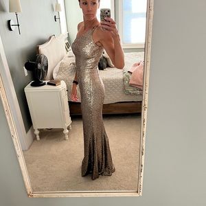 “Dress the Population” one shoulder form fitting sequin gown